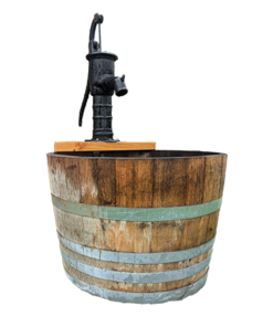 Wine barrel water fountain with cast iron hanf pump